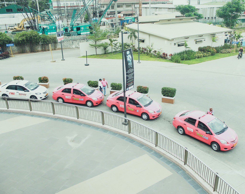 Pink taxis outside Abreeza Mall