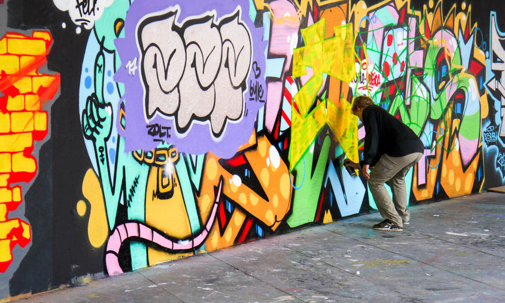 Graffiti artist doing his art