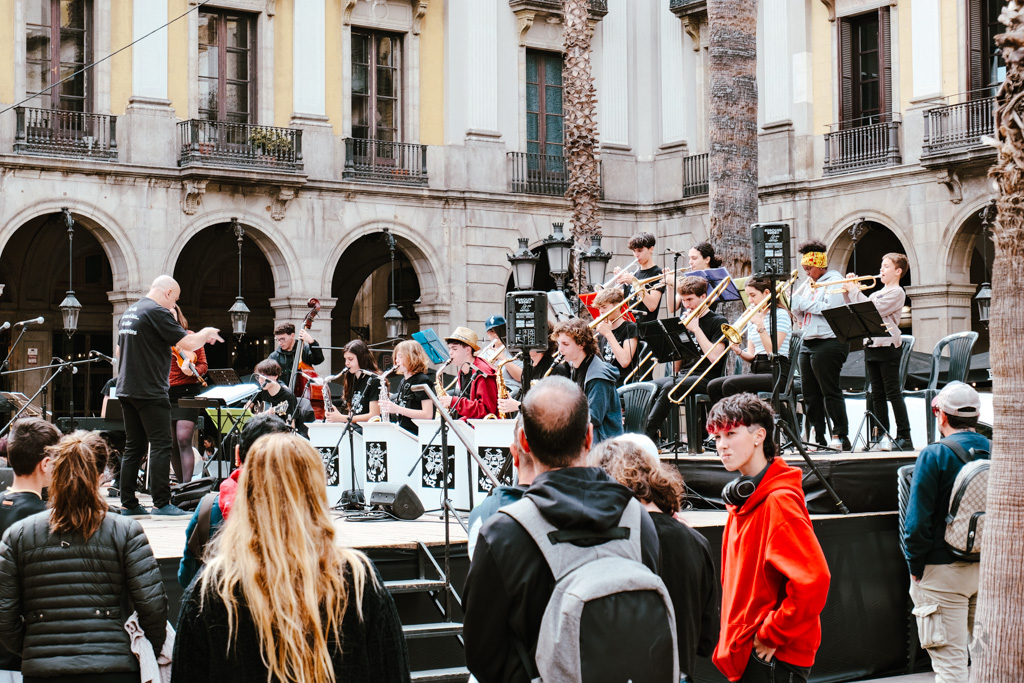An orchestra playing at the square