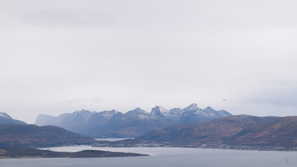 Fjords. Mountains. Airplane