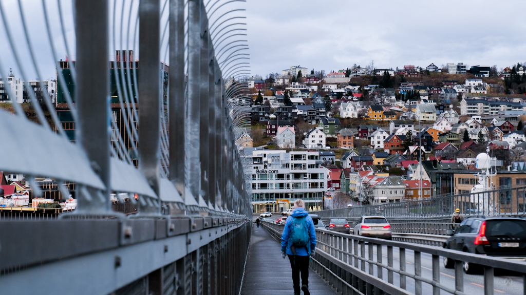 Walking on Tromsø bridge. Those high fence are there for a darker reason.